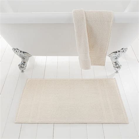 Designer bath mats in cotton terry 